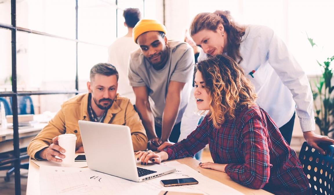Historic site training demonstration showing interpreter engaging with period materials and artifacts