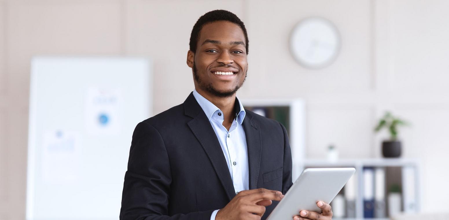 Historic interpretation materials and archival documents spread across research desk
